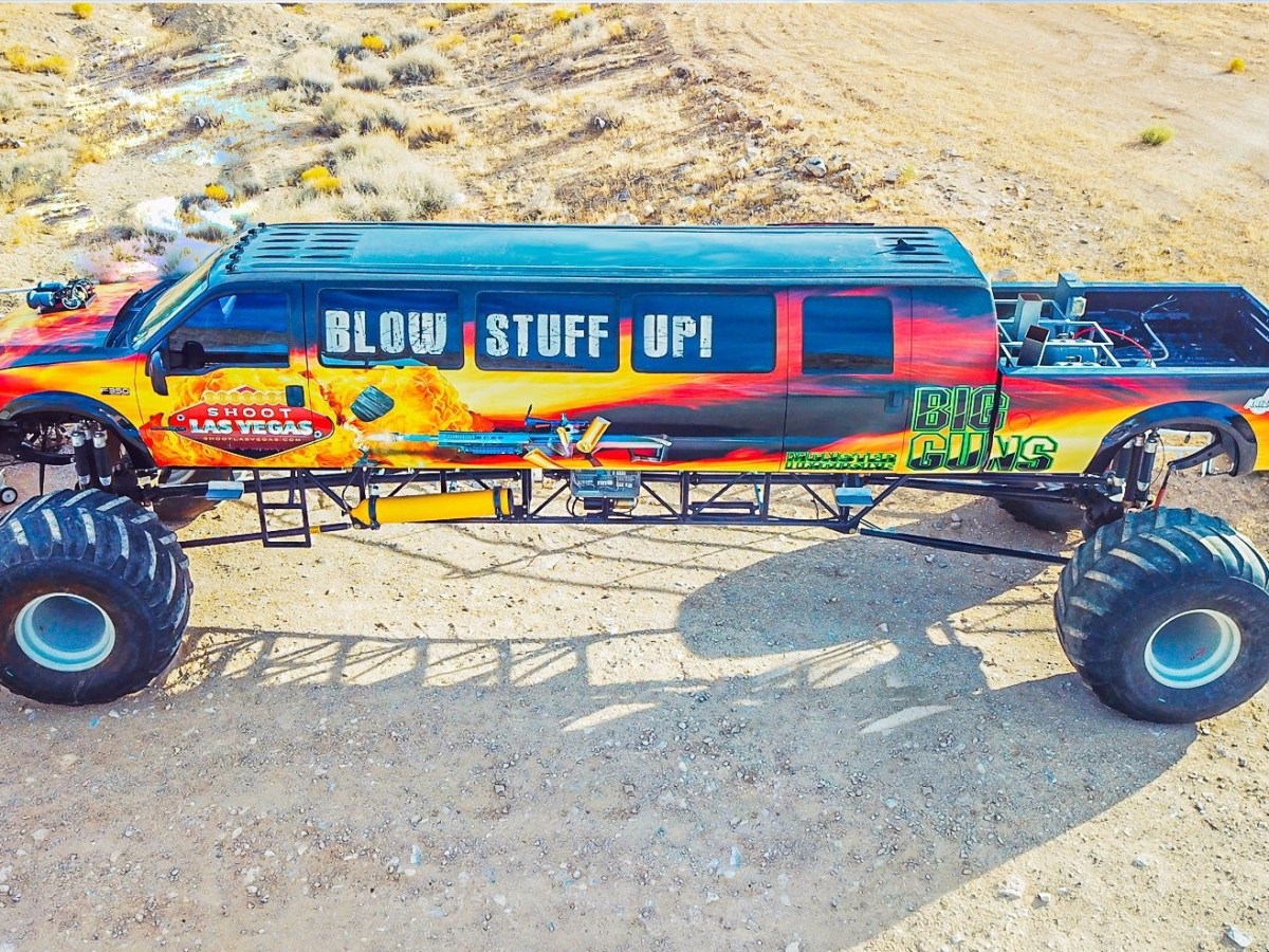 a close up of a toy car on a dirt road